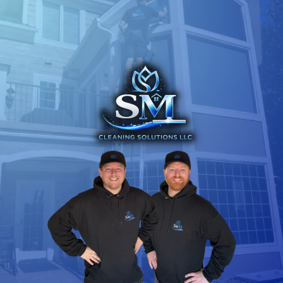 two men wearing black hoodies and black hats with a blue and white logo that reads SM Cleaning Solutions LLC
