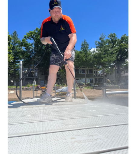 steve pressure washing a dock
