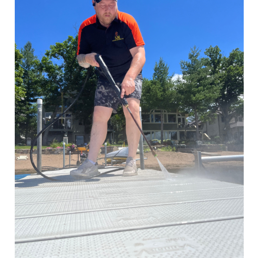 steve pressure washing a dock